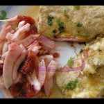 Filetti di branzino aromatizzati accompagnati da insalatina di finocchi ed arance tarocco Filetti di branzino aromatizzati accompagnati da insalatina di finocchi ed arance tarocco