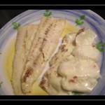 Filetto di merluzzo alle mandorle e spumante con rape alla besciamella di ceci e prosciutto crudo