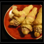 Cannoncini di pasta brisè con ricotta, panna montata e cioccolato