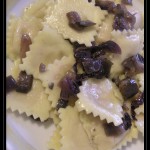 Ravioli di mortadella con radicchio e melanzane brasati