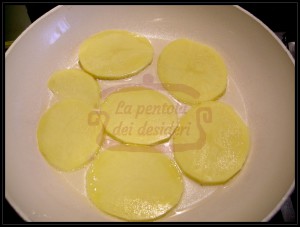 Filetti di nasello con sfoglie di patate