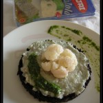 Tortino di riso venere con gorgonzola piccante e cavolfiore e pesto di rucola